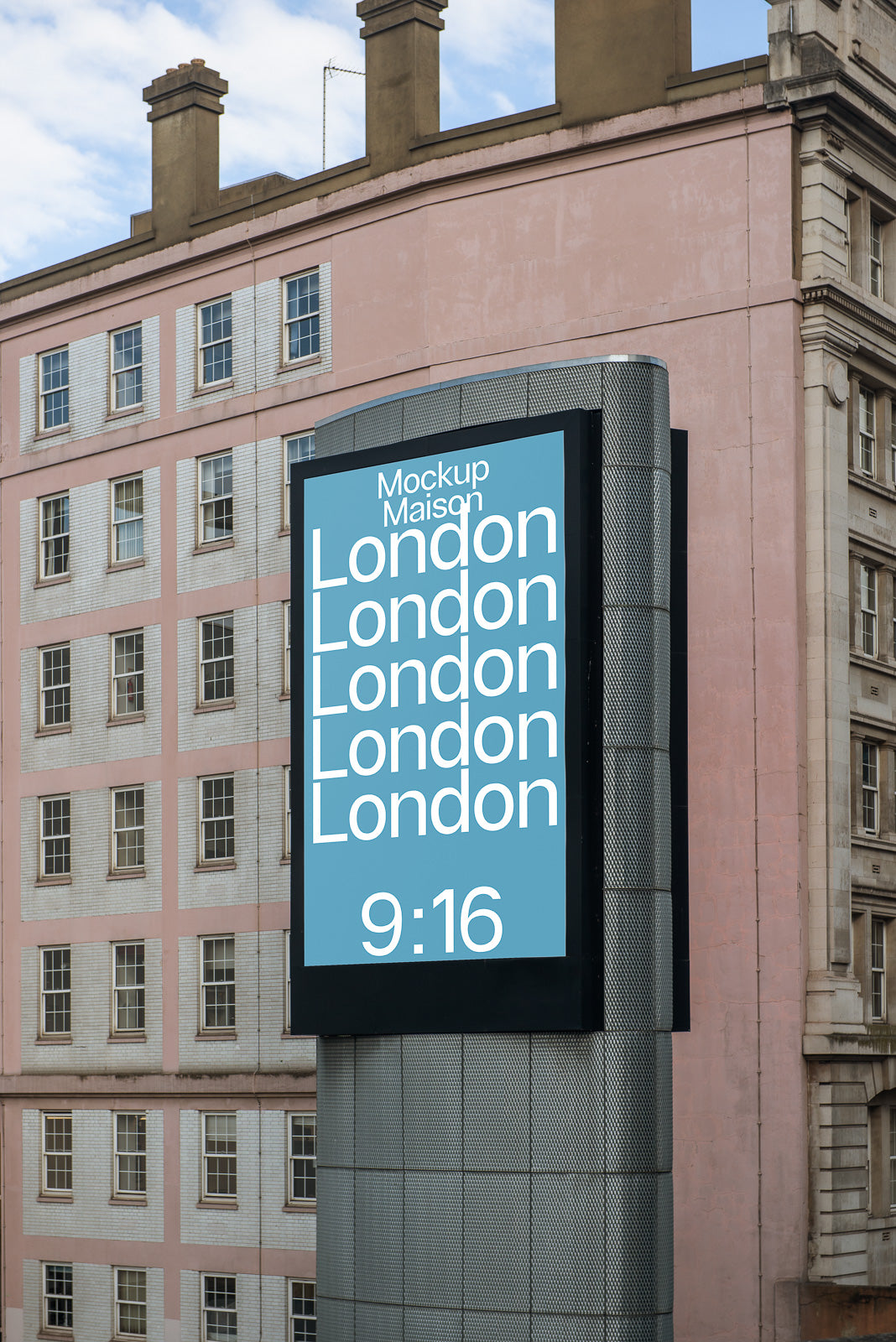 PSD mockup of a large vertical digital billboard on a building exterior featuring repeated text "London" against a pastel pink urban backdrop.