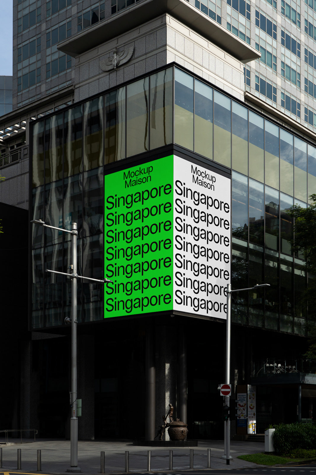 PSD mockup of a building's corner digital display showing repetitive "Singapore" text in black on alternating green and white backgrounds.
