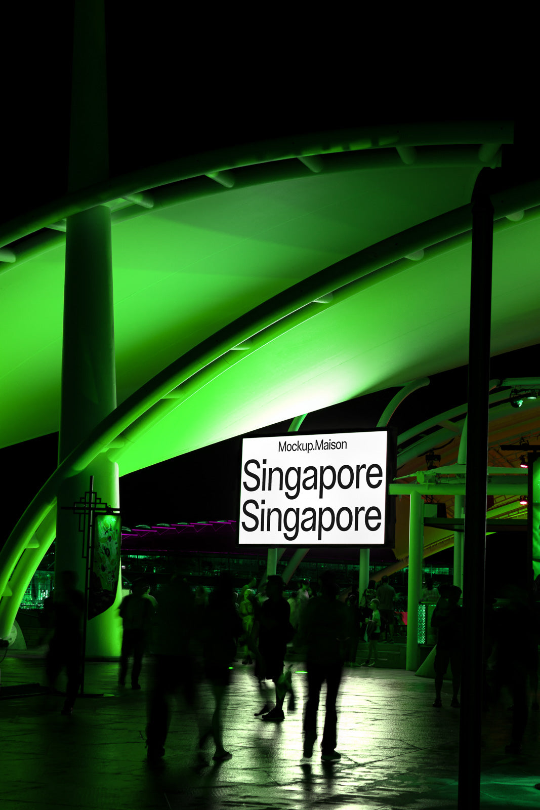PSD mockup of a rectangular sign under a green-illuminated canopy at night, featuring "Mockup.Maison Singapore Singapore" text with people walking below.
