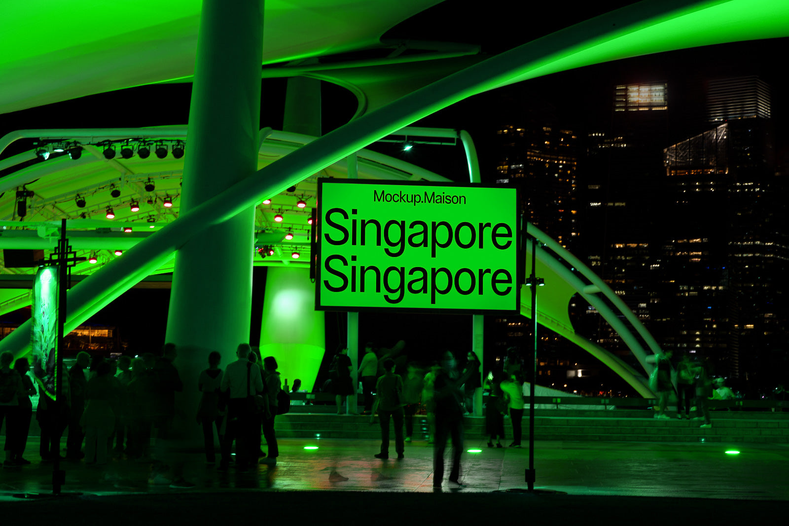 PSD mockup of a nighttime scene with a glowing green sign displaying the word "Singapore" twice, surrounded by modern architectural elements and city skyline.