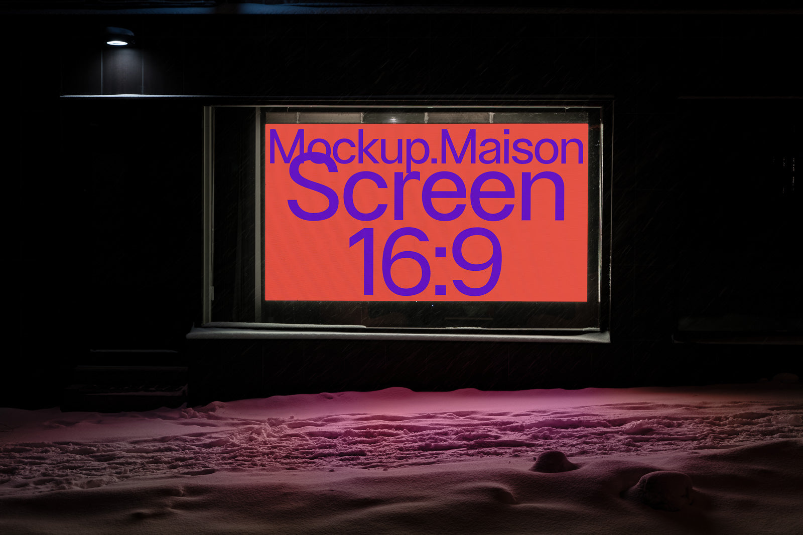 PSD mockup of a large screen with "Mockup.Maison Screen 16:9" text in bright colors, set in a window display above snow at night.