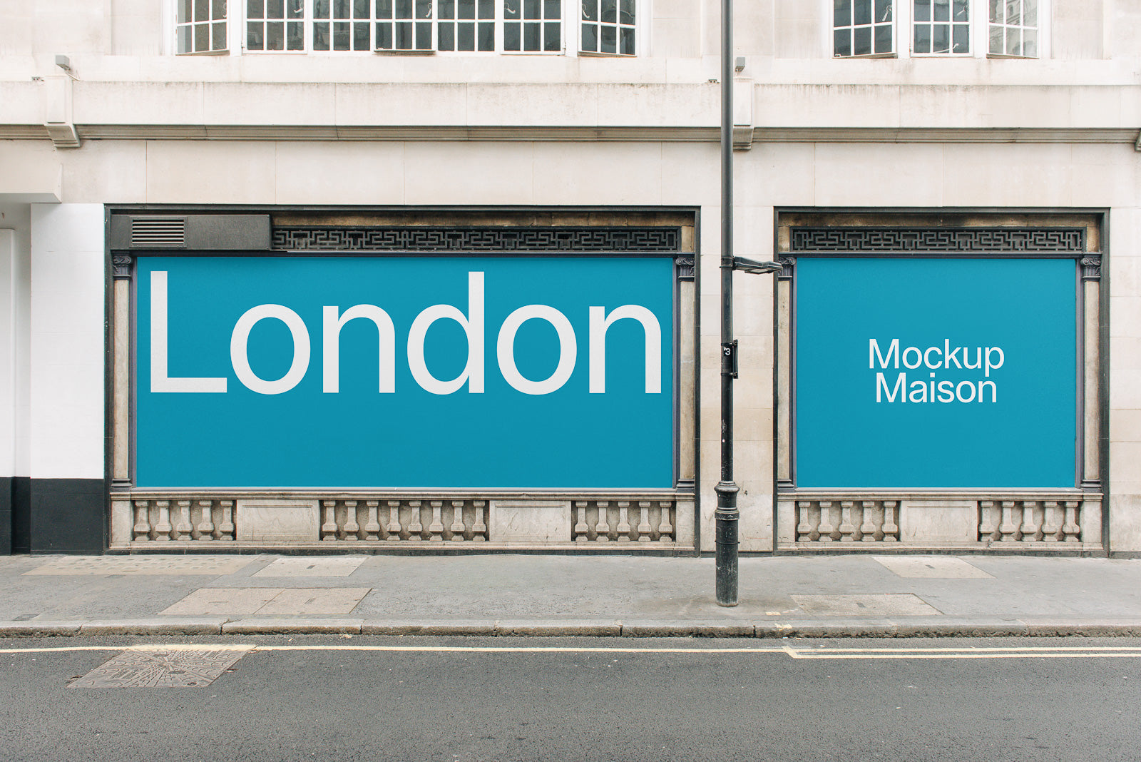 PSD mockup of a blue storefront display featuring the words "London" and "Mockup Maison" in white text on a city street background.