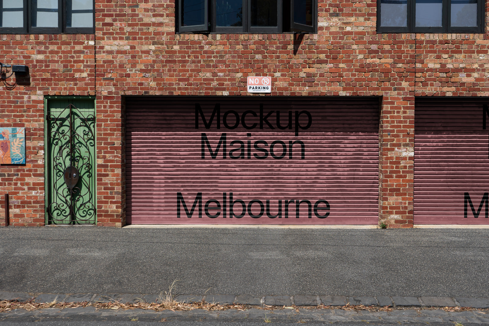 PSD mockup of a red brick building facade with a green door and a pink garage door displaying the text "Mockup Maison Melbourne."