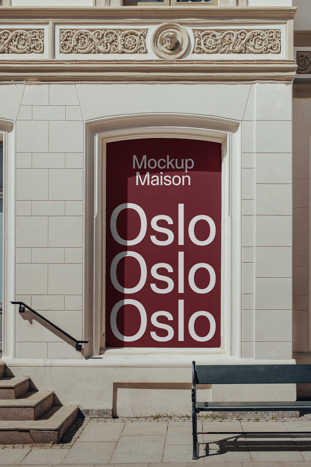 PSD mockup of a maroon storefront with "Mockup Maison" and repeated "Oslo" text in white, set within a detailed stone facade featuring decorative carvings.