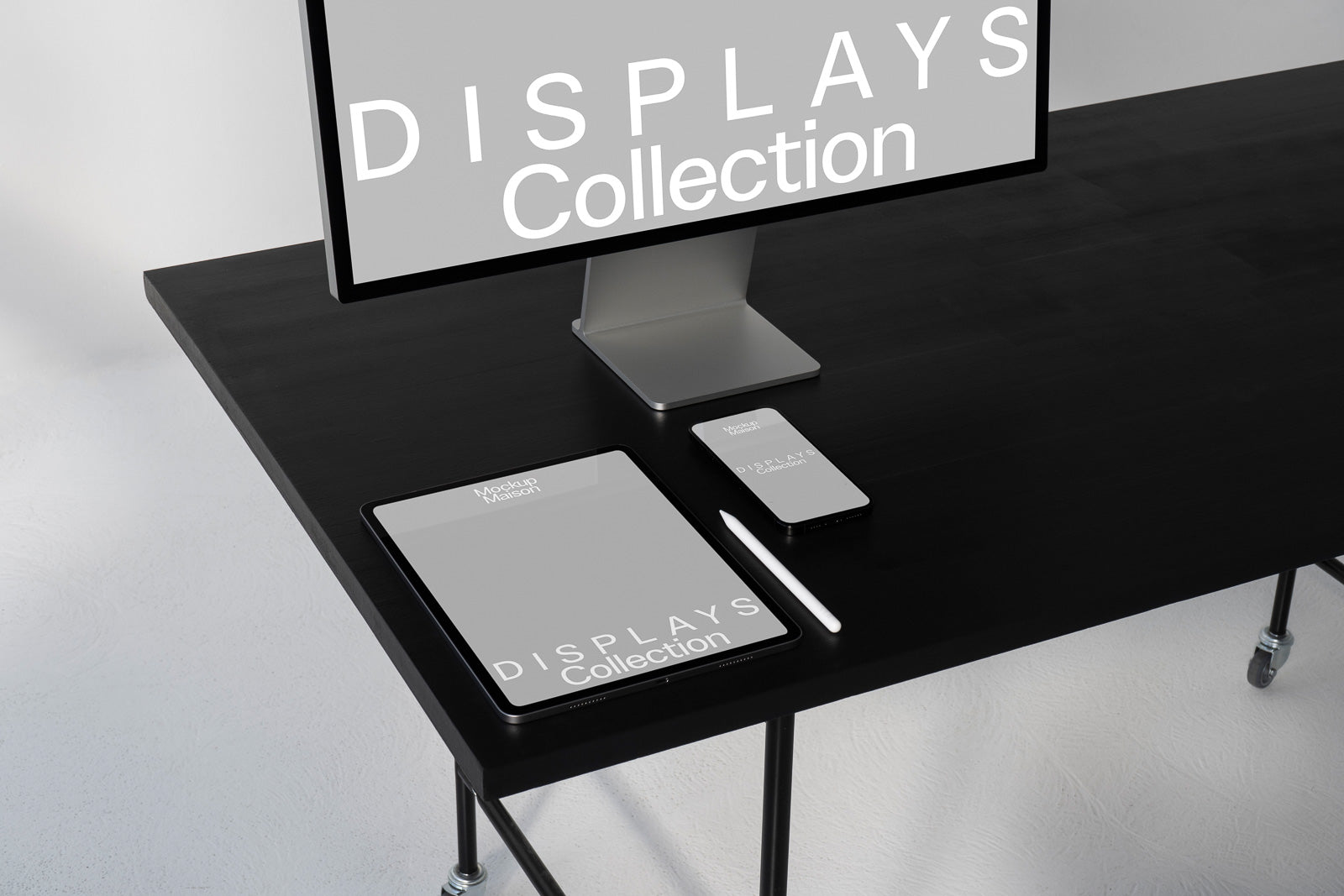 PSD mockup of a digital workspace featuring a monitor, tablet, smartphone, and stylus on a black table, all displaying "DISPLAYS Collection" graphics.