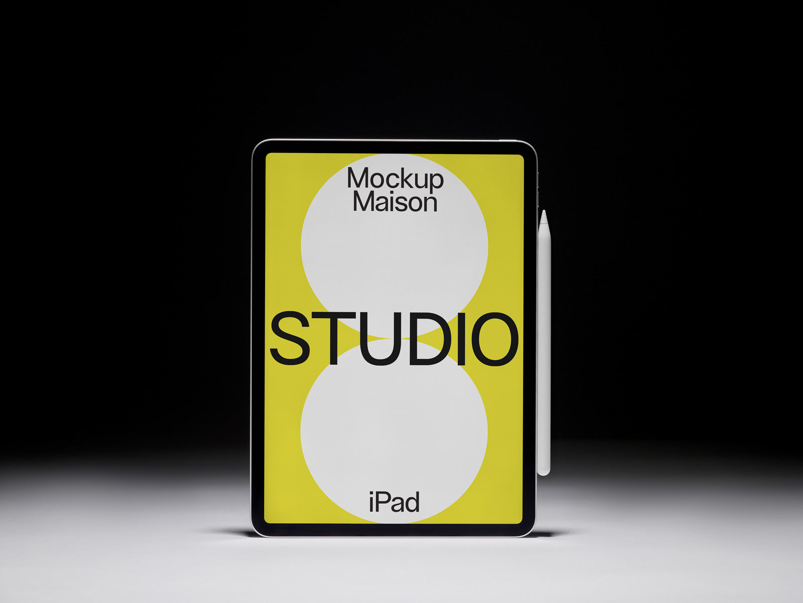PSD mockup of a tablet displaying a bold, modern design with "Mockup Maison Studio" text, set against a vibrant yellow and white background.