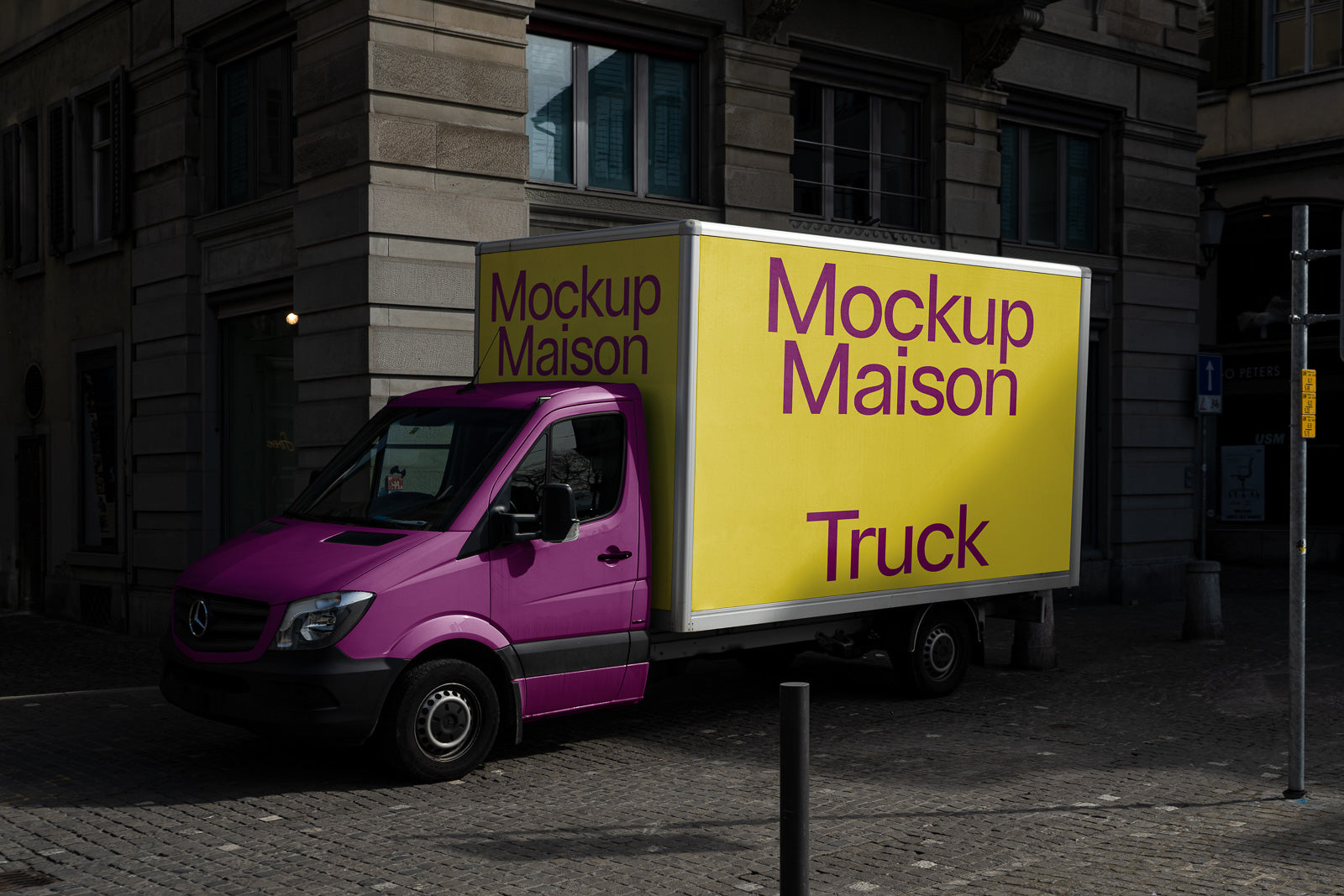 PSD mockup of a vibrant pink and yellow delivery truck parked on a cobblestone street, with "Mockup Maison Truck" written on the side panel.
