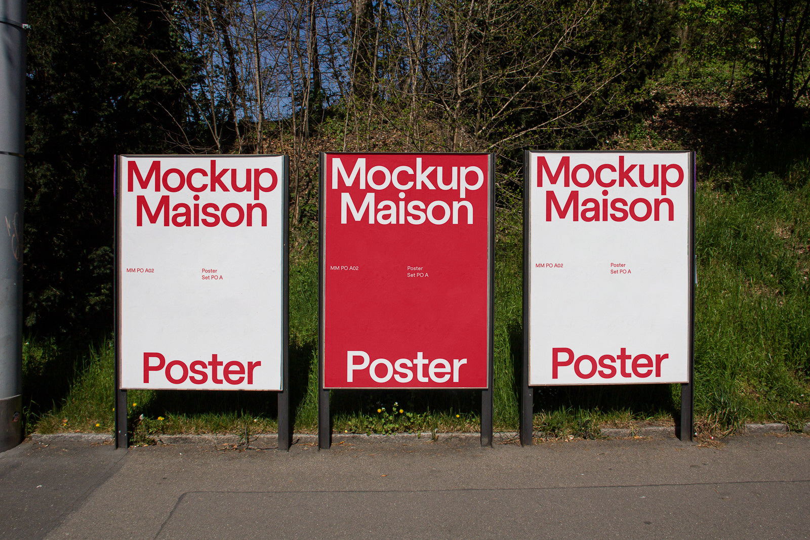 PSD mockup of three outdoor poster displays with "Mockup Maison" text, arranged in a row against a grassy background and trees.