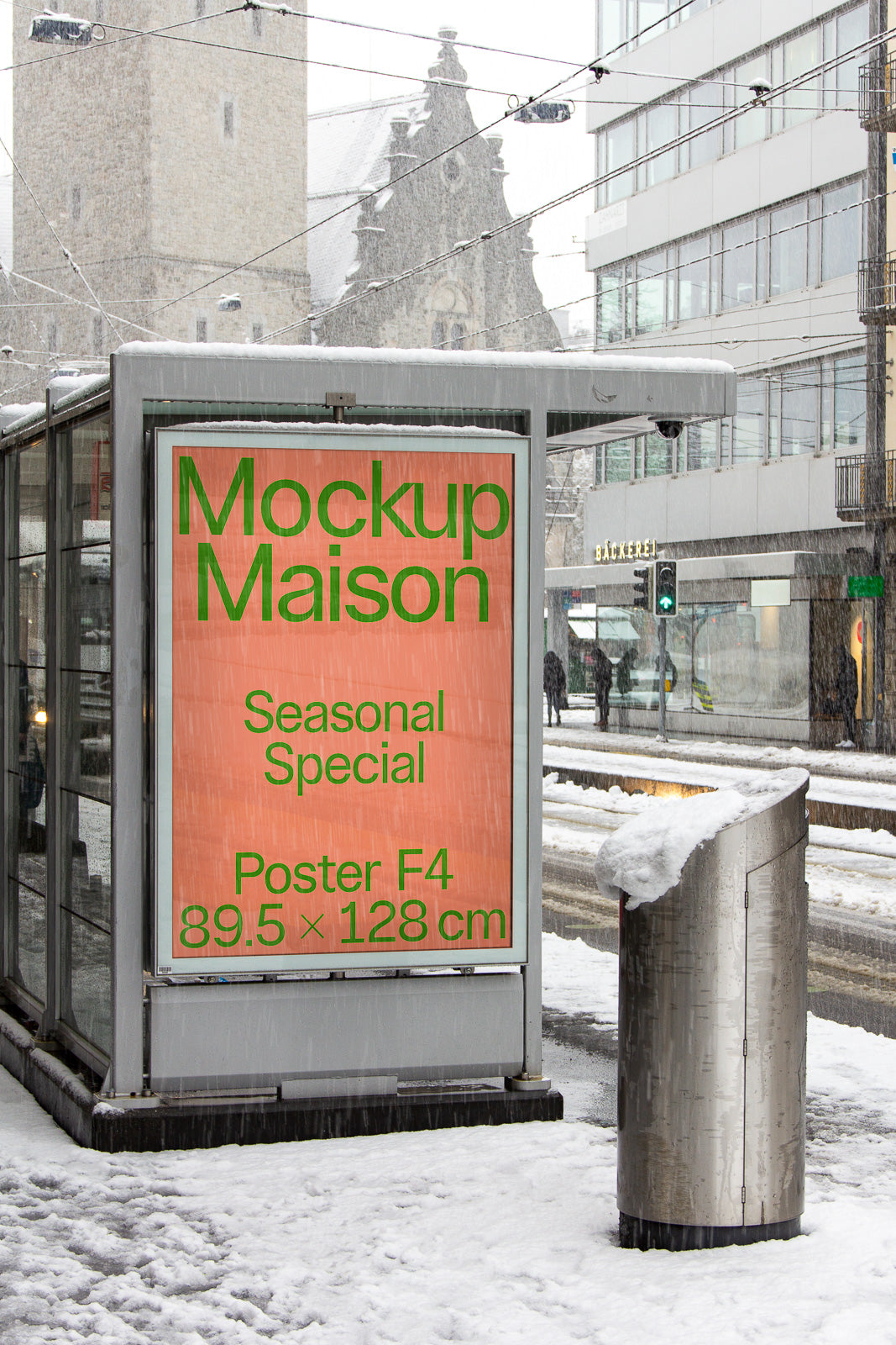 PSD mockup of a large advertisement poster on a snowy street, displayed in a glass shelter, showcasing a vibrant design with text details.