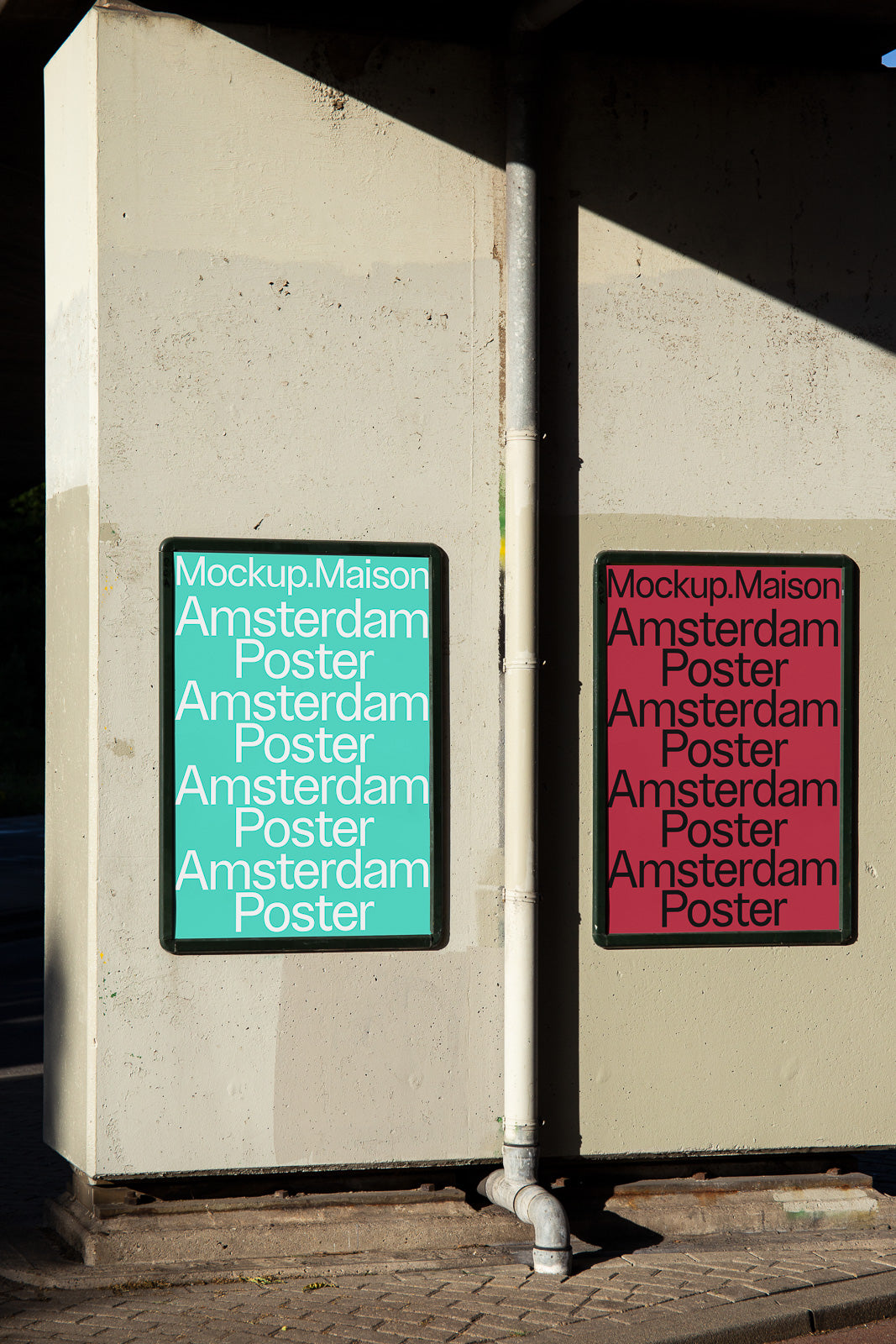 PSD mockup of two posters on an outdoor wall, with one in teal and white text and the other in maroon and black text, titled Mockup.Maison.