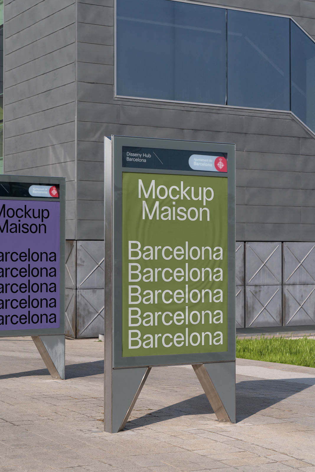PSD mockup of outdoor signage at Disseny Hub Barcelona, featuring the text "Mockup Maison" and "Barcelona" in white on green and purple backgrounds.