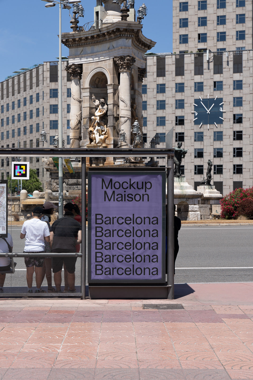 PSD mockup of a bus stop with a purple advertisement displaying "Mockup Maison" and "Barcelona" multiple times, set against a cityscape with a historic monument and a clock on a building.