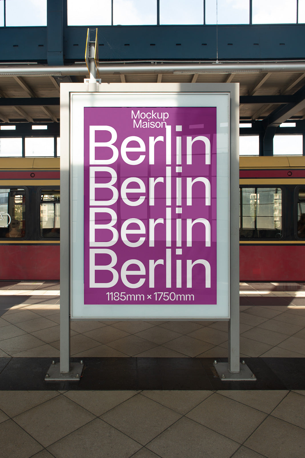 PSD mockup of a large, vertical poster stand in an urban train station. Poster features the word "Berlin" repeated in bold white letters on a purple background.