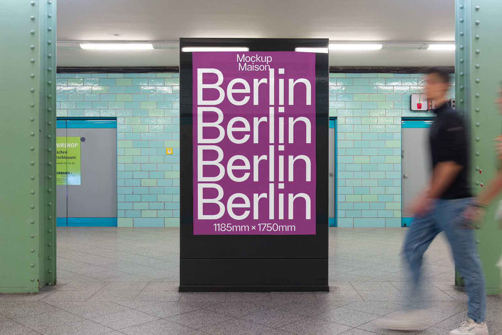 PSD mockup of a poster displayed in a subway station, featuring the word "Berlin" repeated with dimensions 1185mm x 1750mm, surrounded by a tiled wall.