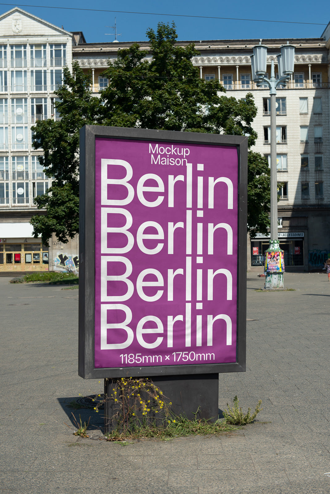 PSD mockup of an outdoor advertising display with a purple background featuring repeated text "Berlin" and dimensions 1185mm x 1750mm.