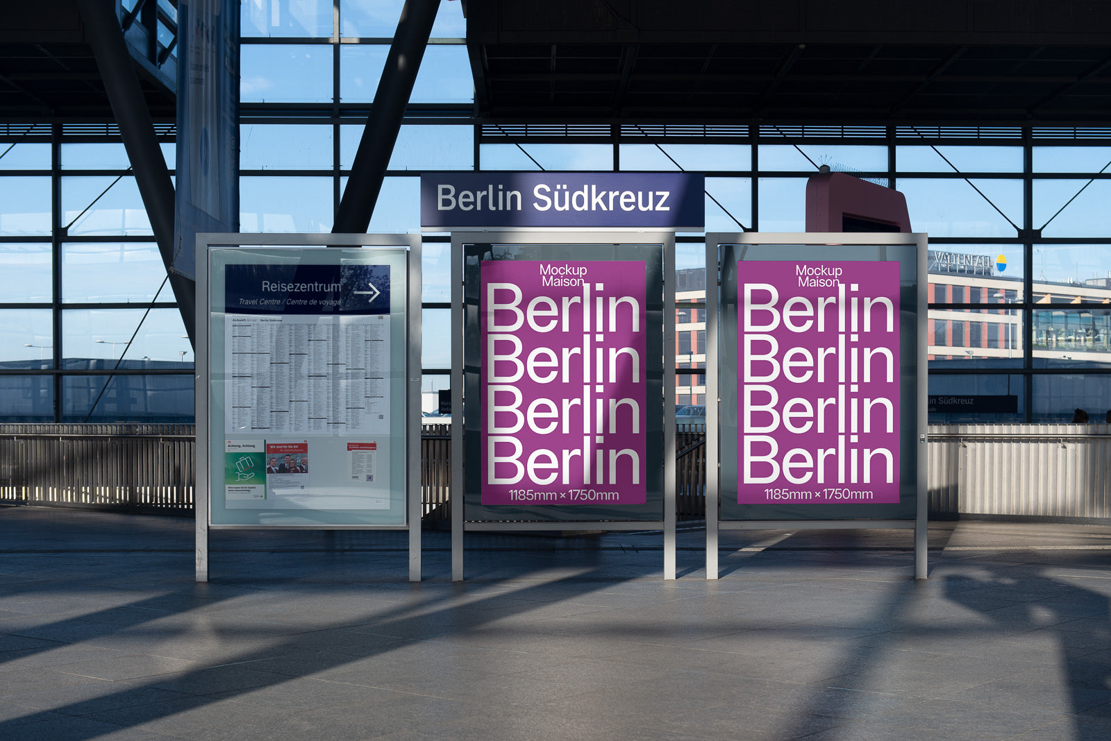 PSD mockup of three large illuminated posters displayed in a modern train station setting with station signage indicating Berlin Südkreuz.