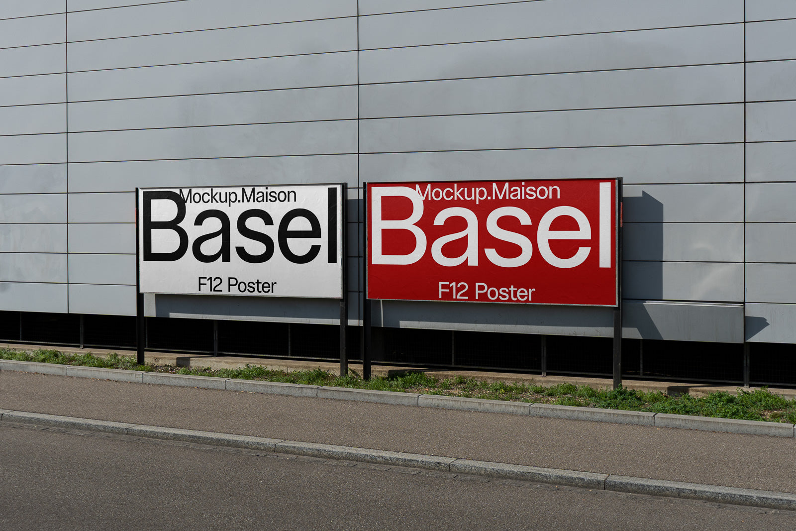 PSD mockup of two large posters on a metal wall, one with a black background, the other red, both displaying the word "Basel" prominently.