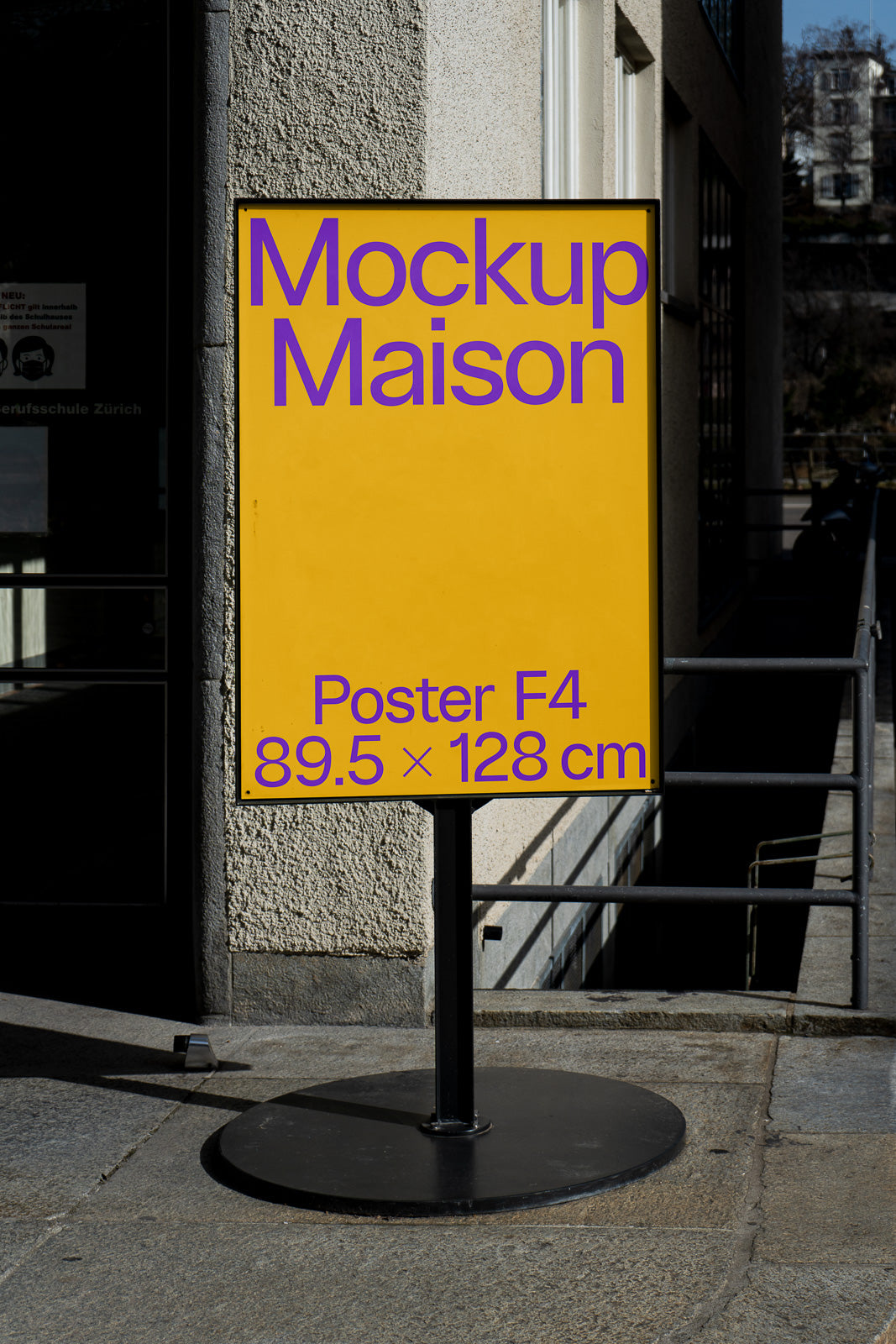 PSD mockup of a large outdoor poster display with text "Mockup Maison" in purple on a yellow background, indicating dimensions 89.5 × 128 cm.