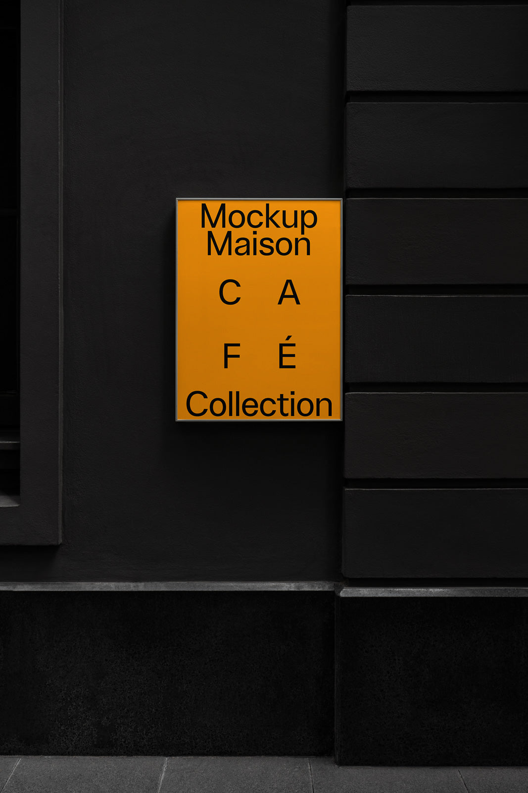 PSD mockup of a bright yellow signboard on a dark building wall, with text displaying "Mockup Maison Café Collection" in bold black letters.