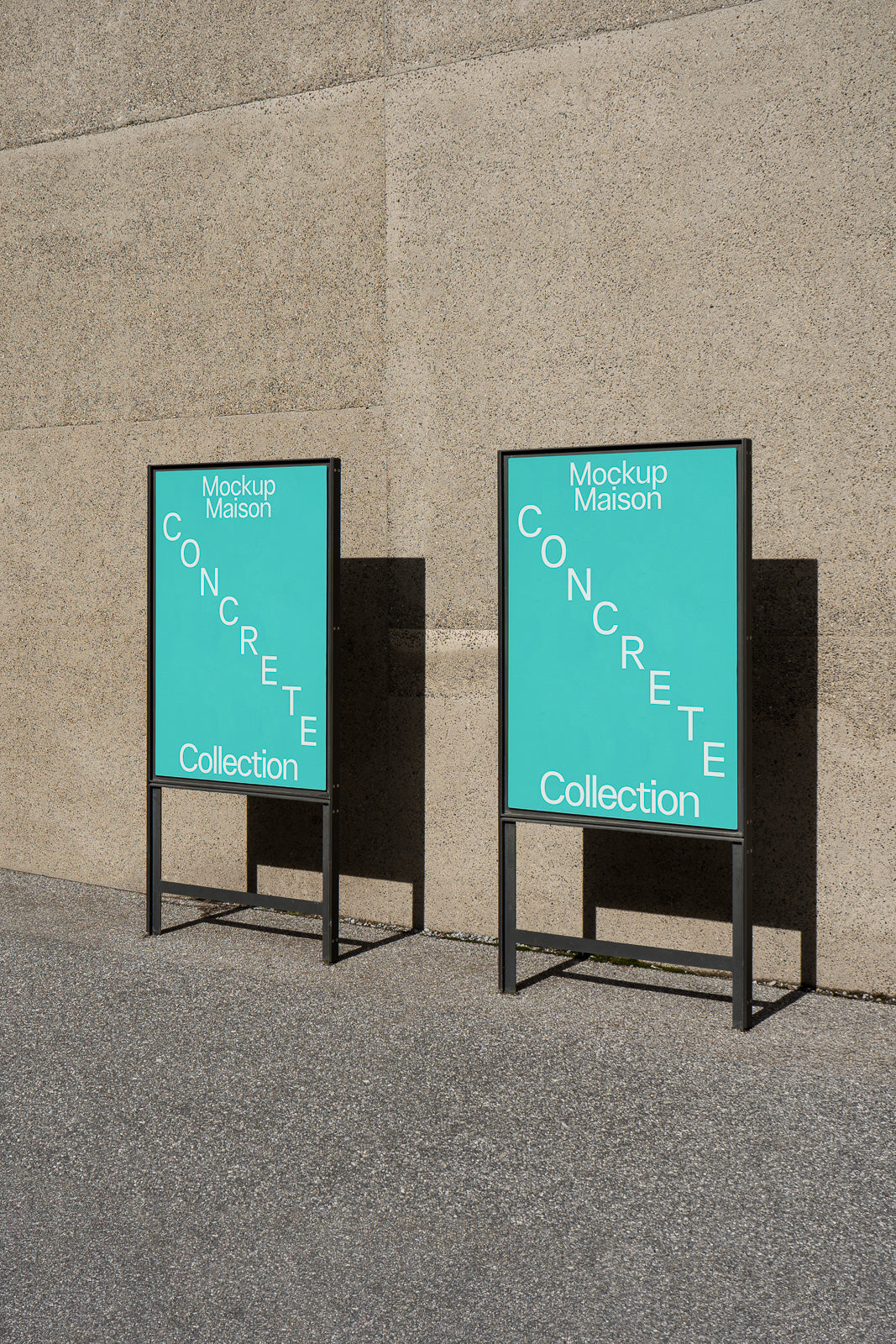 PSD mockup of two standing posters on a textured concrete background with "Mockup Maison Concrete Collection" in teal and white text.
