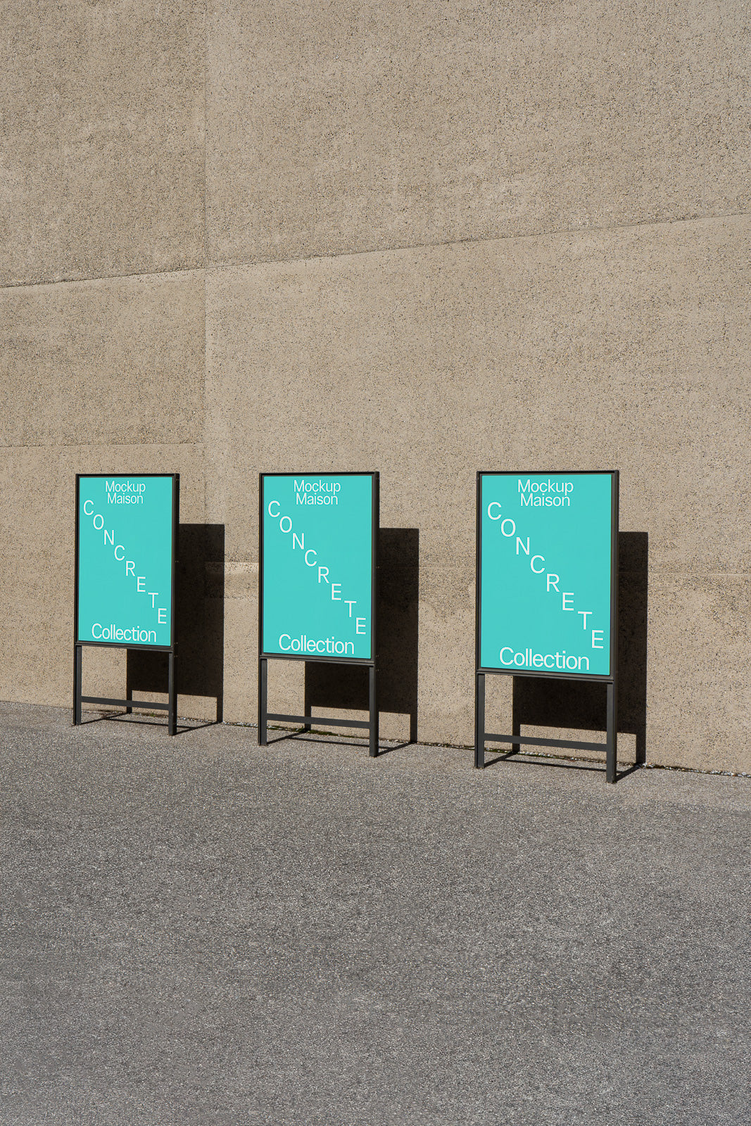 PSD mockup of three turquoise sidewalk signs against a concrete wall, each displaying "Mockup Maison" and "Concrete Collection" text.
