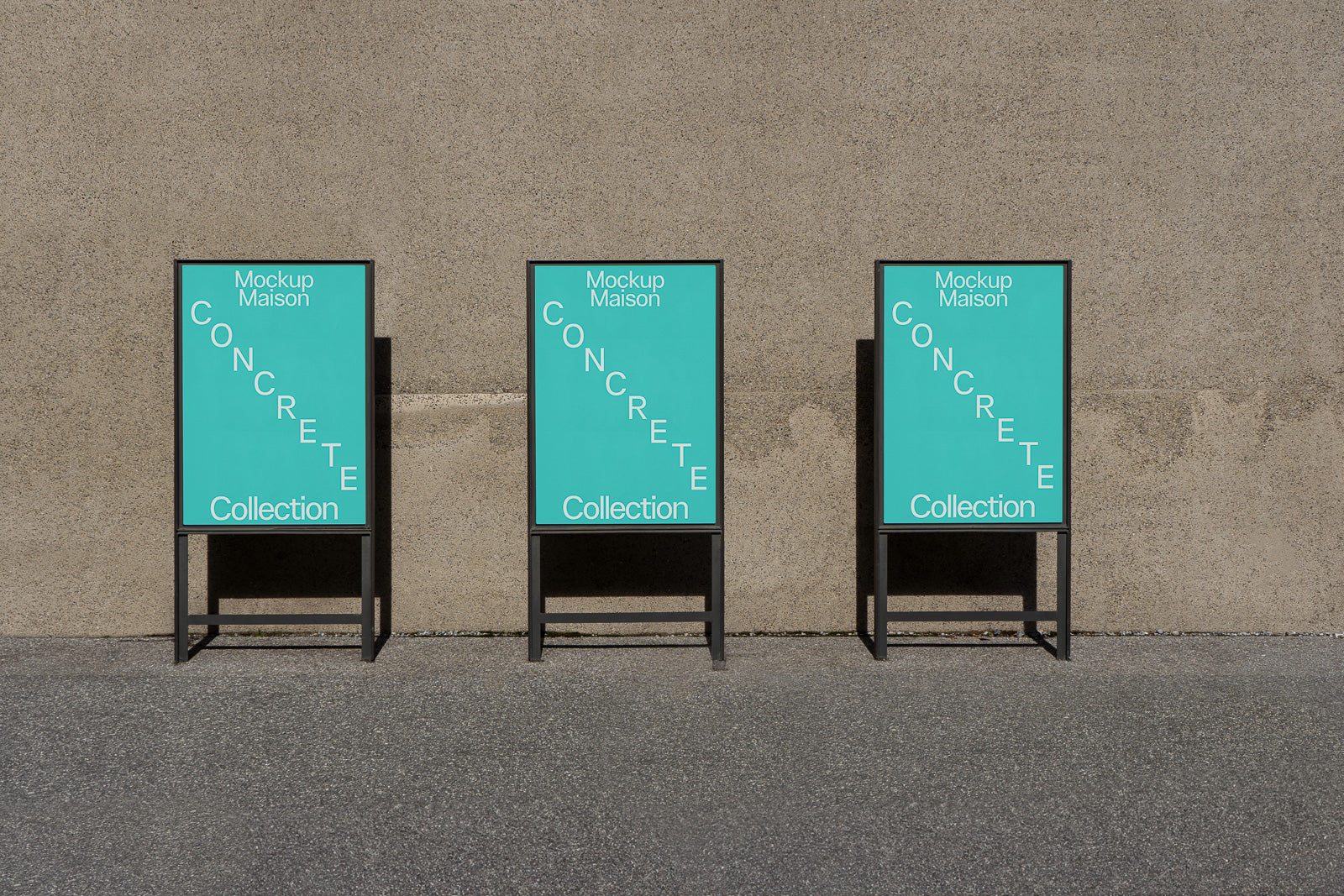 PSD mockup of three teal posters with "Mockup Maison Concrete Collection" text, set against a concrete wall and standing on a gray pavement.
