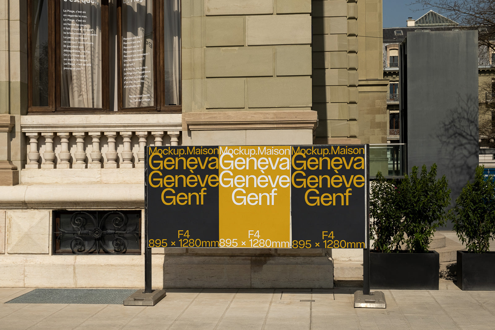 PSD mockup of three F4 posters with the text "Geneva Geneve Genf" displayed on a stand, set against an urban building facade.