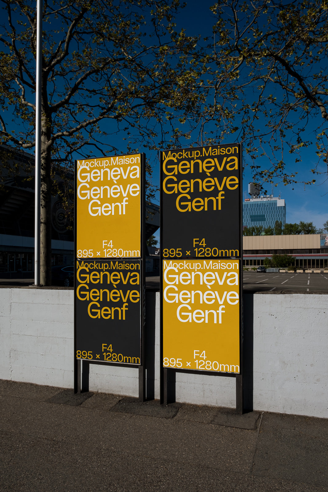 PSD mockup of two outdoor signs displaying "Geneva, Genève, Genf" in bold yellow text against a dark background with dimensions 895 x 1280mm.