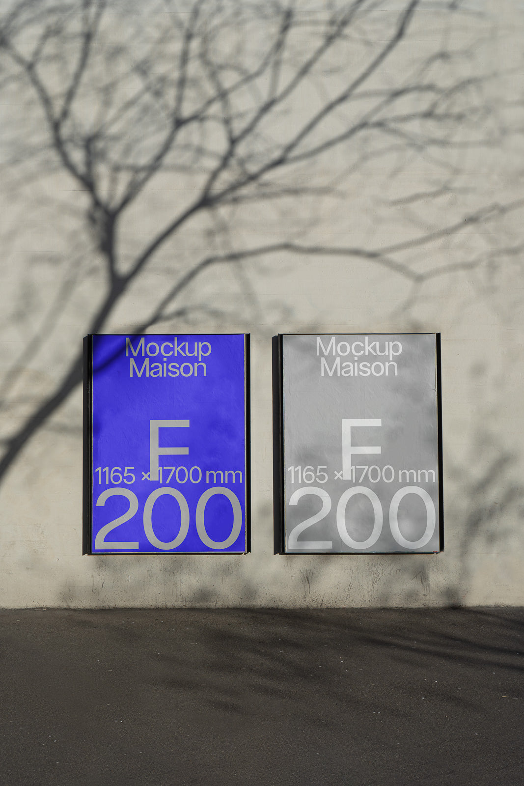 PSD mockup of two posters on an outdoor wall, one blue and one gray, each displaying dimensions 1165 x 1700 mm and marked with letter "F" and number 200.