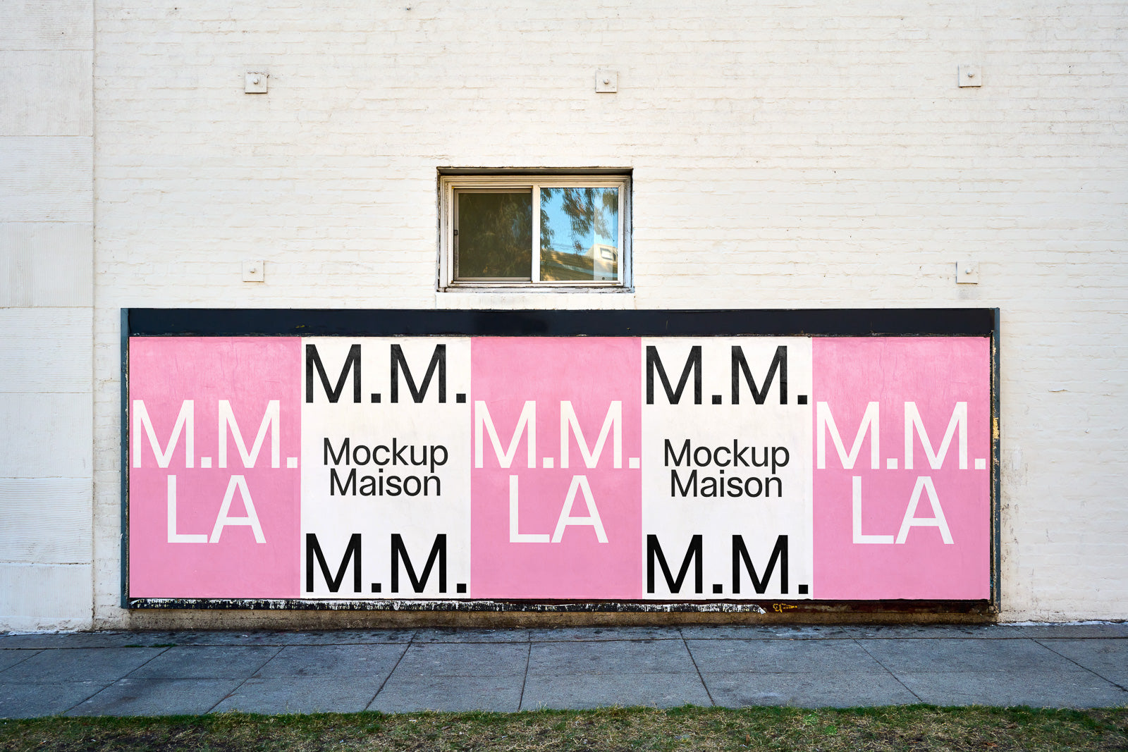 PSD mockup of a large outdoor poster displayed on a white brick wall, featuring stylized text with letters "M.M. LA" in alternating pink and white sections.