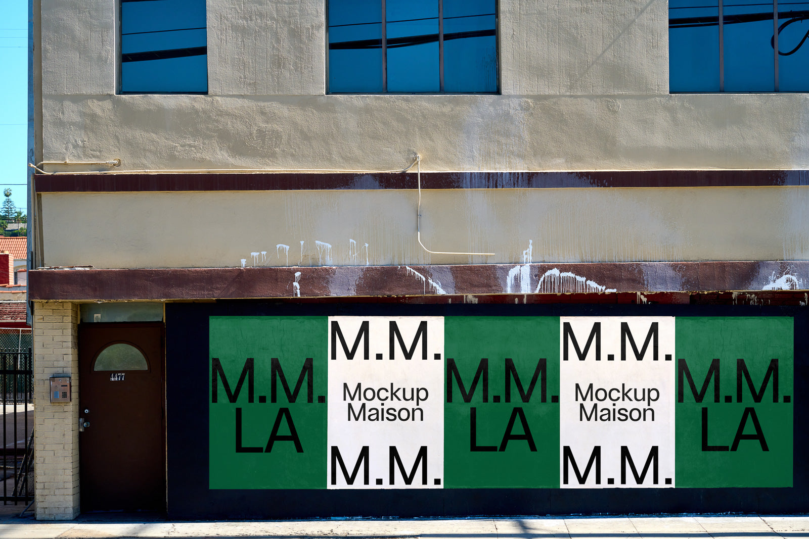 PSD mockup of a storefront with a large, green and white banner featuring the text "M.M. LA" and "Mockup Maison" in bold black letters.