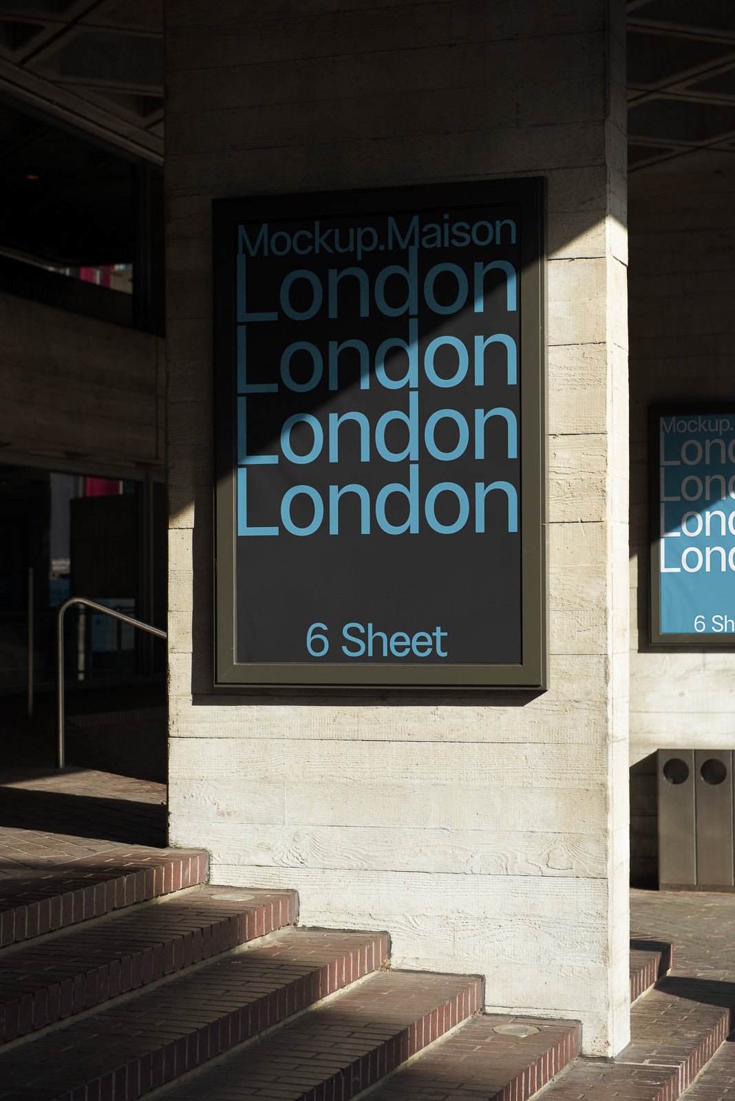 PSD mockup of a building exterior with a framed poster displaying the word "London" repeatedly in blue text on a dark background.