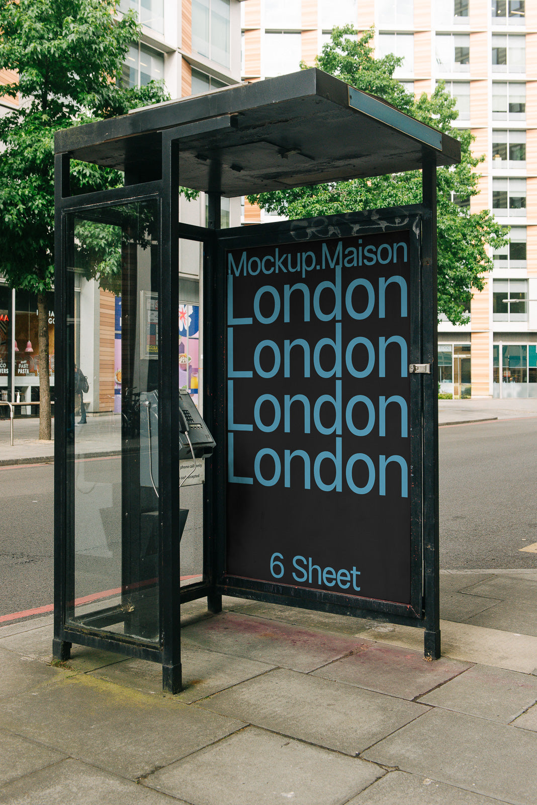 PSD mockup of a bus stop advertisement featuring the word "London" repeated in a modern font, set against an urban backdrop with trees.