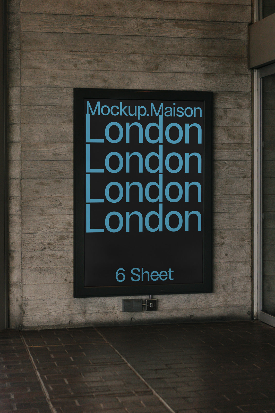 PSD mockup of a poster display on a concrete wall featuring repeated word "London" in large blue text with "Mockup.Maison" at the top.
