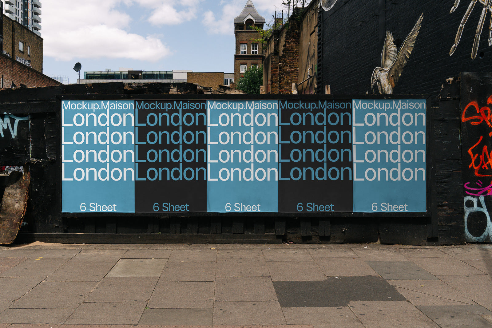 PSD mockup of outdoor billboard displaying repeated text "London" with varied background colors, set in an urban environment with street art.