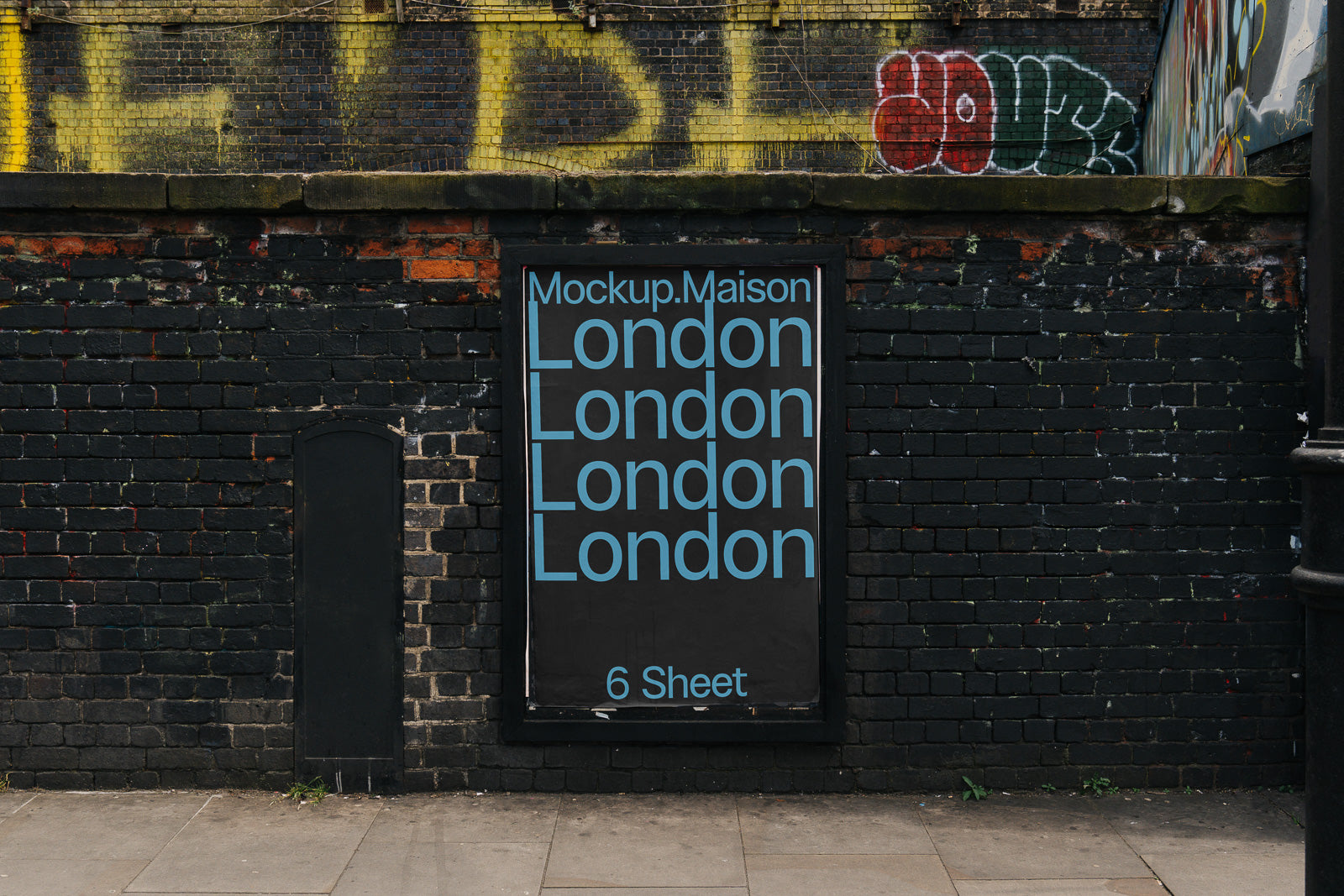 PSD mockup of a large poster on a brick wall featuring the word "London" in blue text repeated vertically. The background shows graffiti and urban textures.