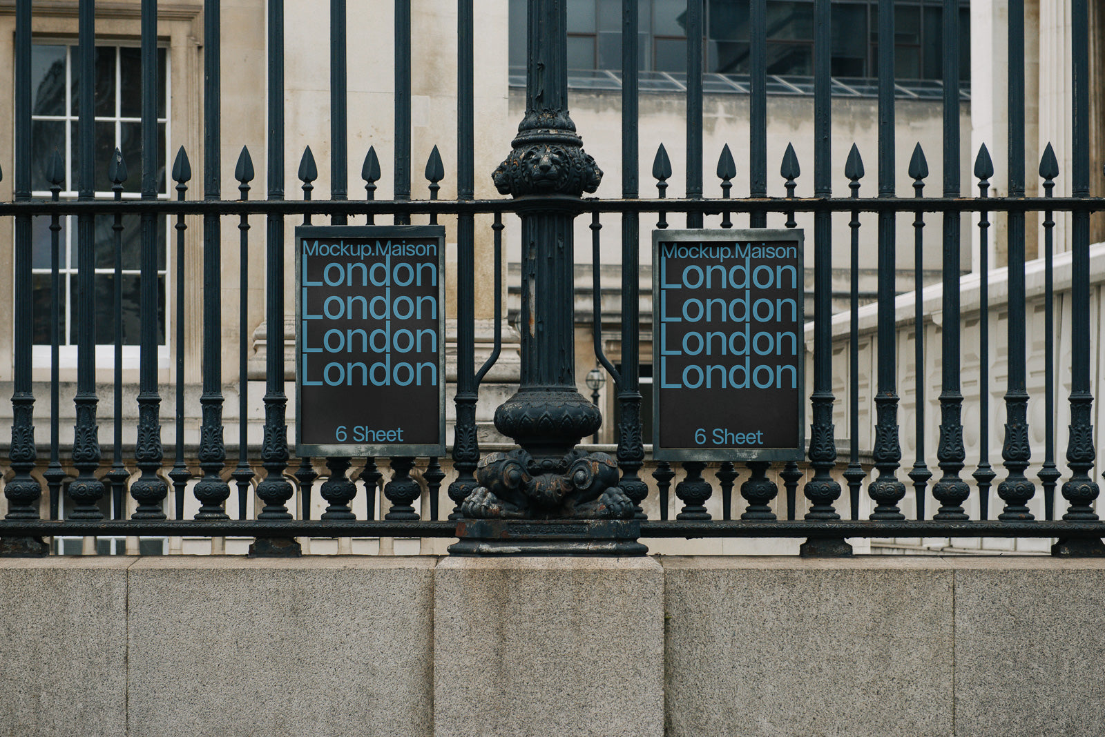 PSD mockup of two black posters on a wrought iron fence, featuring repeating text "London" and "Mockup.Maison" with a classic stone building facade behind.