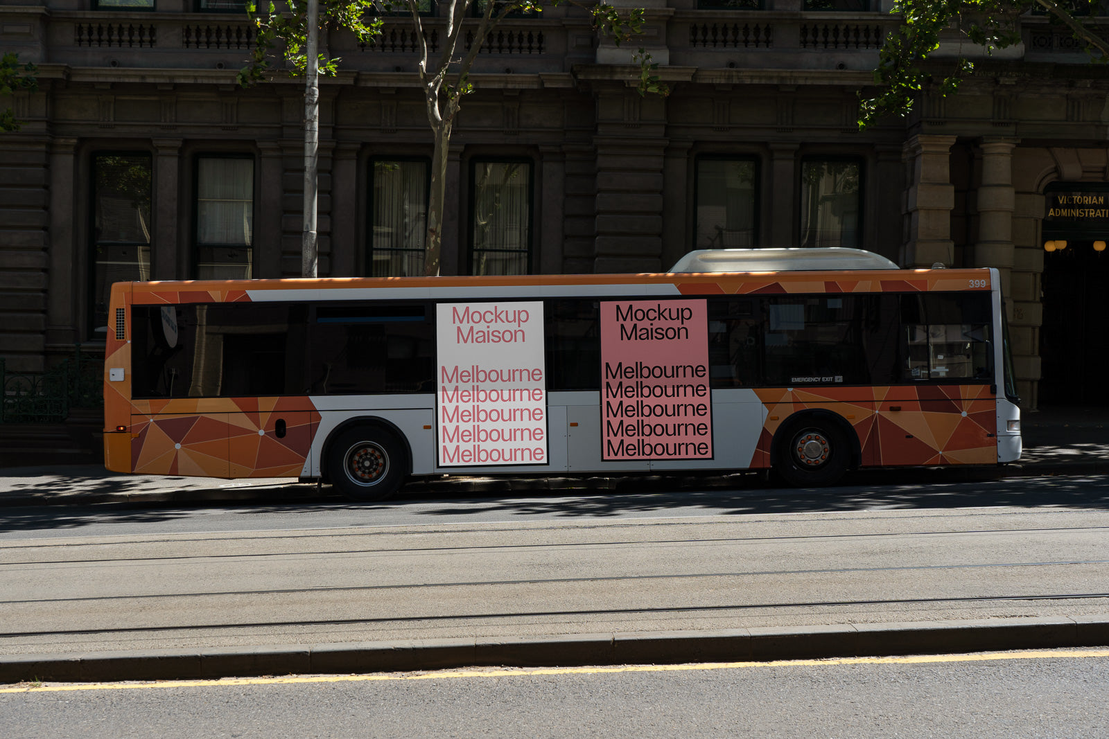 PSD mockup of a city bus featuring geometric orange and white designs, with placeholder text banners displayed on the side under a tree-lined street.