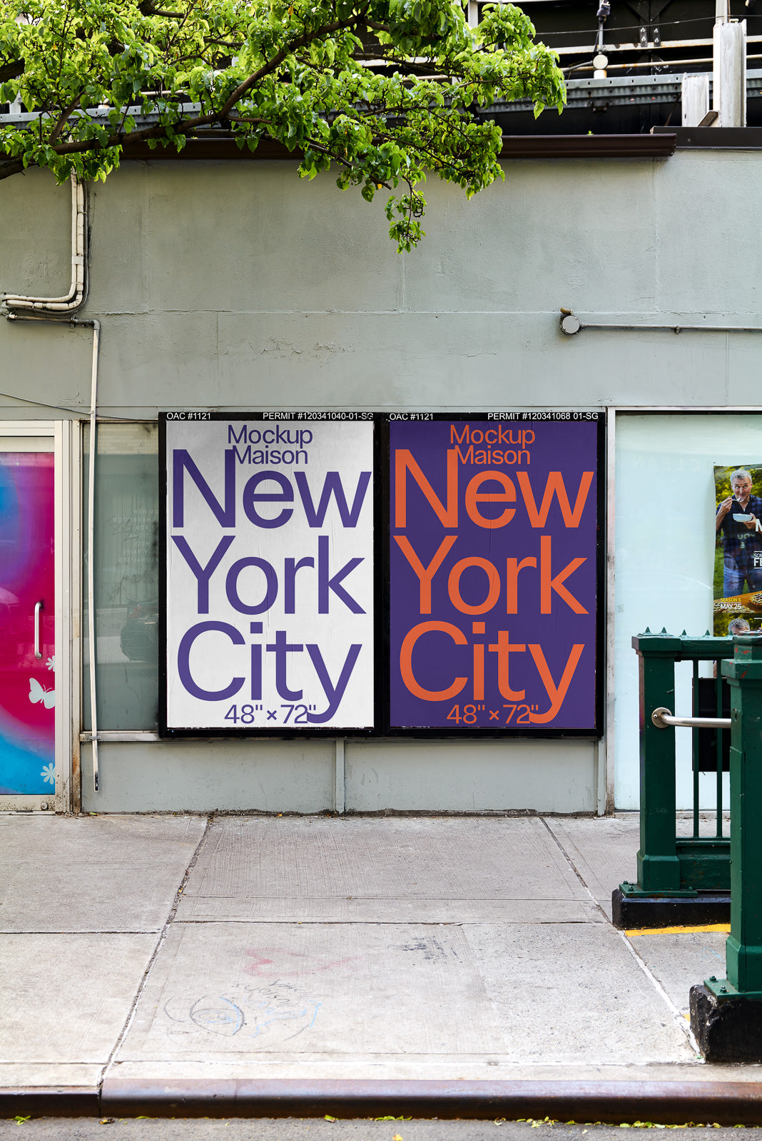 PSD mockup of two "New York City" posters on an exterior wall, featuring purple and orange text under green tree branches on a city street.