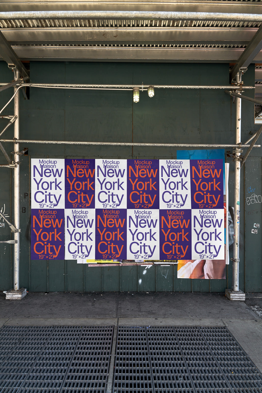 PSD mockup of a street poster display featuring repeated "New York City" text in bold colors, mounted on a construction site barricade.