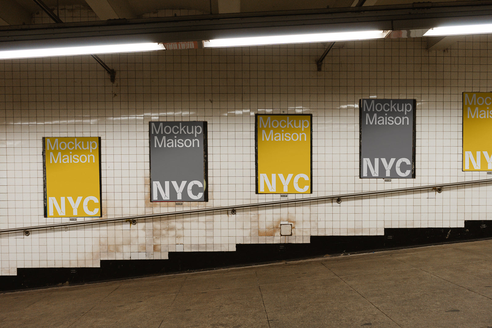 PSD mockup of four posters in a subway station, featuring "Mockup Maison" and "NYC" text on alternating yellow and gray backgrounds, tiled wall backdrop.