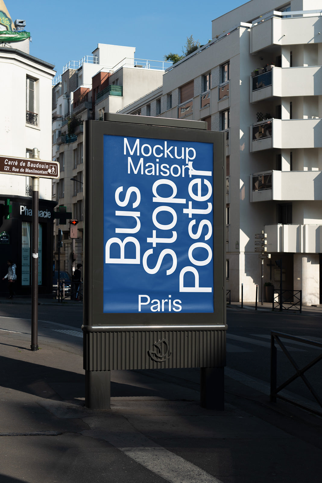PSD mockup of bus stop poster display on a city street, featuring clear blue sky and surrounding urban buildings in Paris.