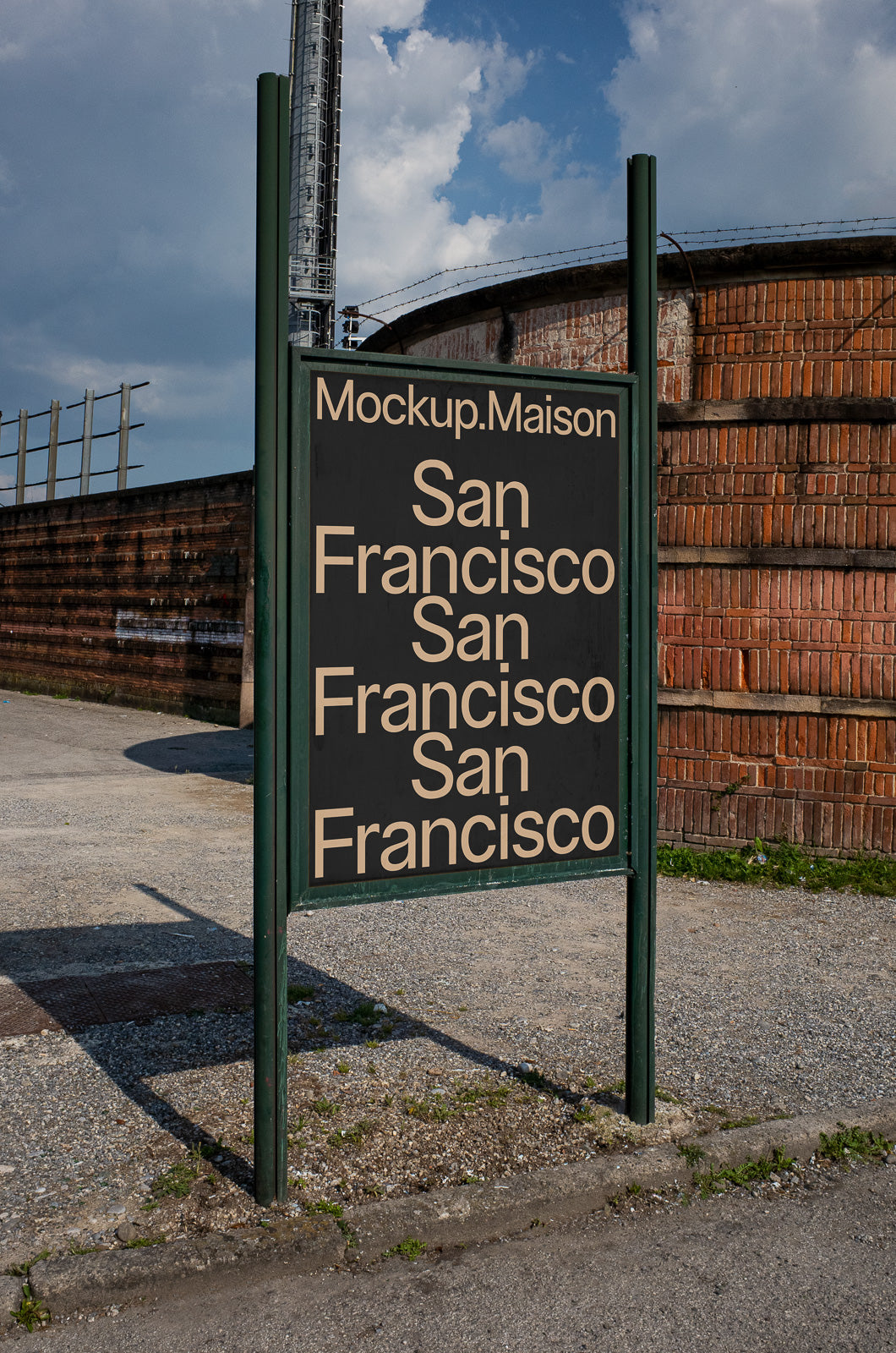 PSD mockup of a signage board displaying the text "San Francisco" multiple times, set against a backdrop of brick and industrial elements.