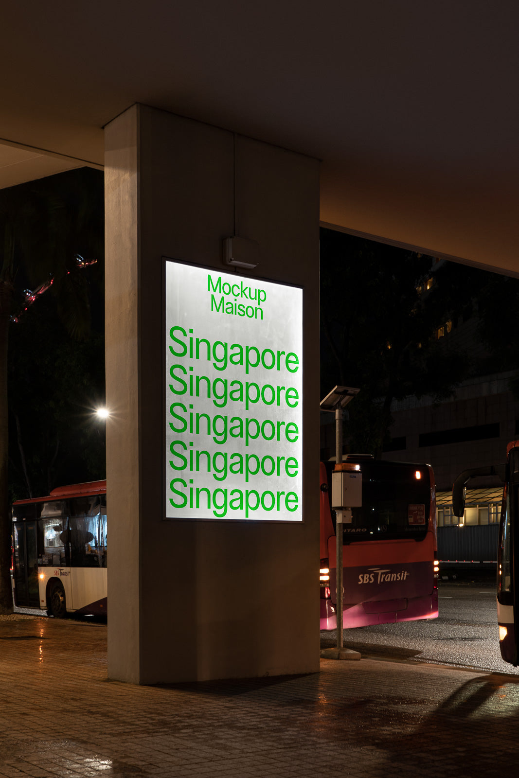 PSD mockup of an illuminated sign at a bus stop displaying "Singapore" repeatedly in green text, with buses parked nearby during nighttime.