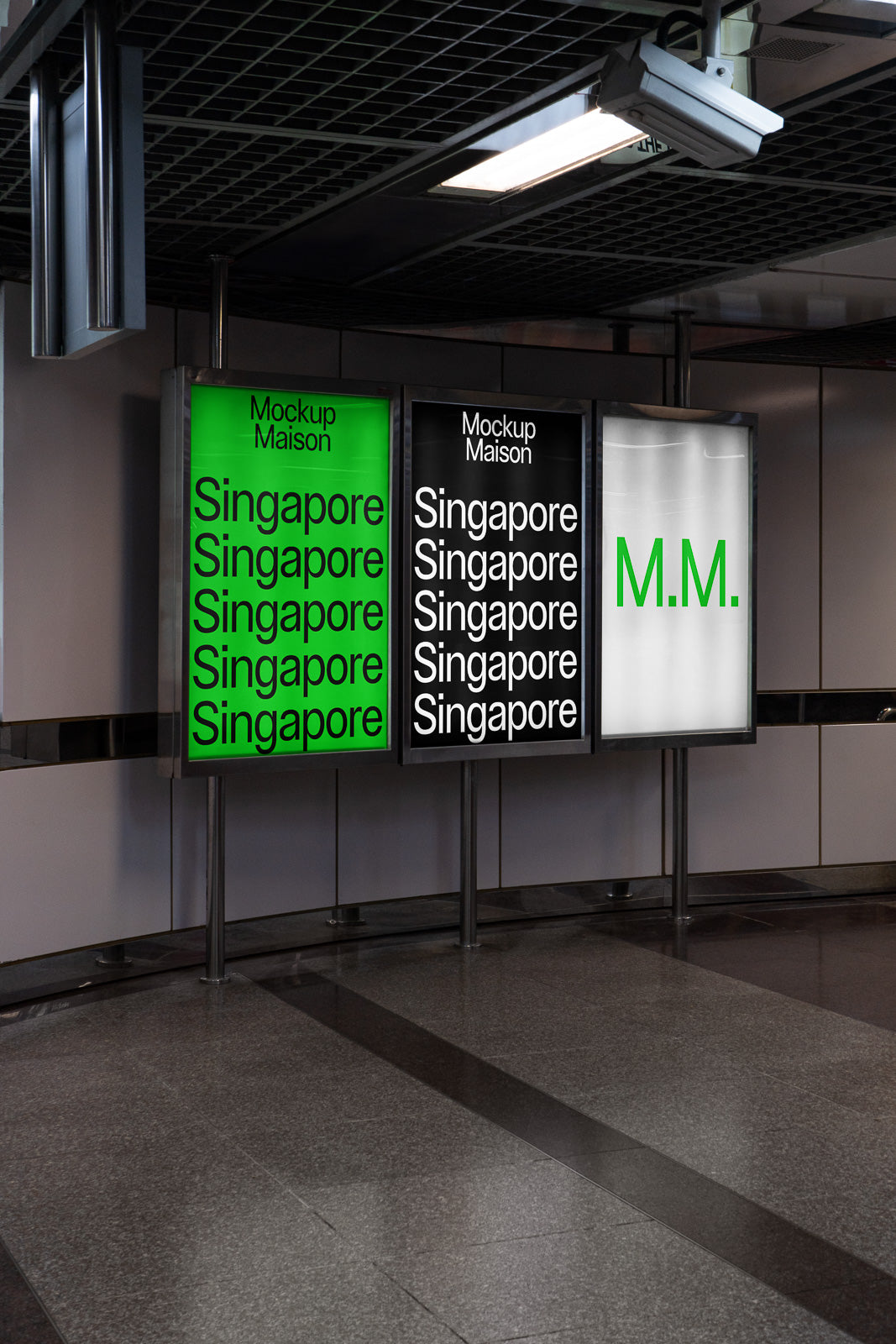 PSD mockup of a trio of backlit advertising panels in a modern interior, displaying "Singapore" repeatedly in black and green with "M.M." on the right.