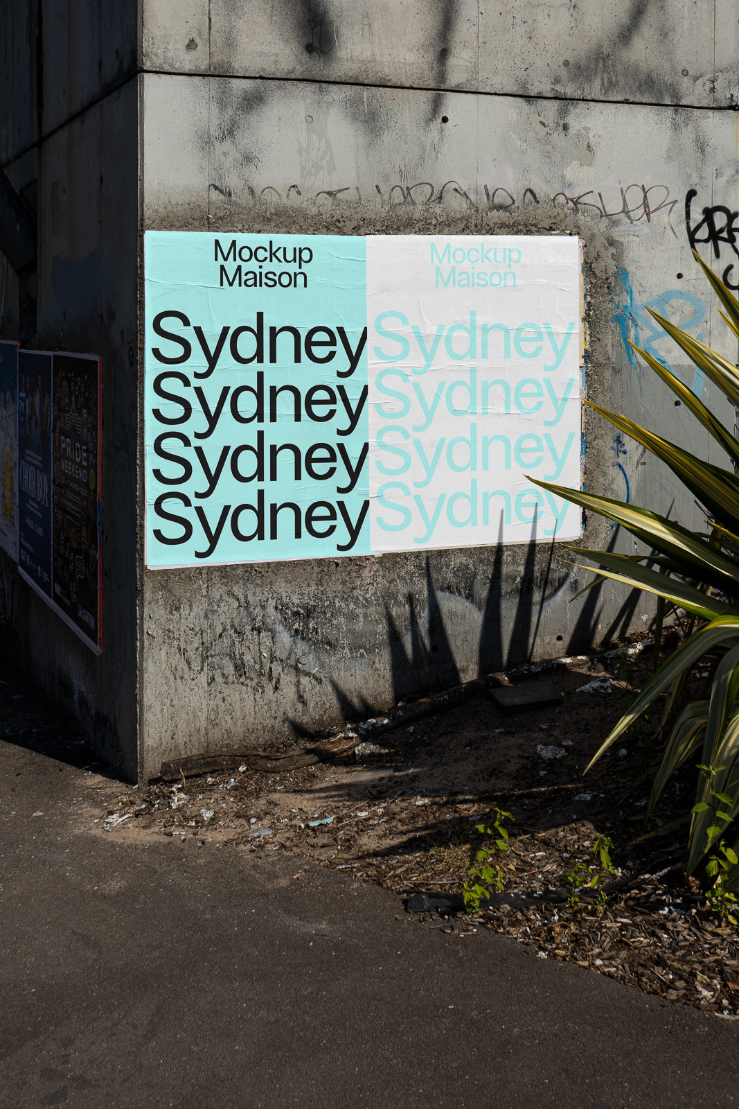 PSD mockup of a grunge city wall with posters, displaying repeated "Sydney" text in various fonts and shades, partially weathered and textured.