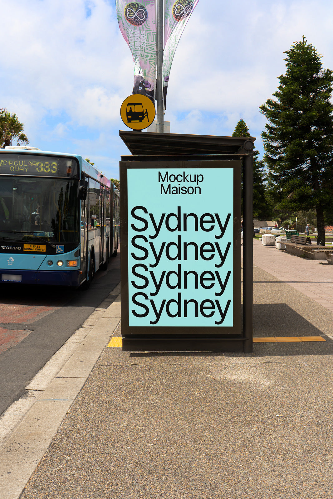 PSD mockup of a bus shelter ad display featuring the word "Sydney" repeated multiple times with a bus visible in the background, creating an urban setting.