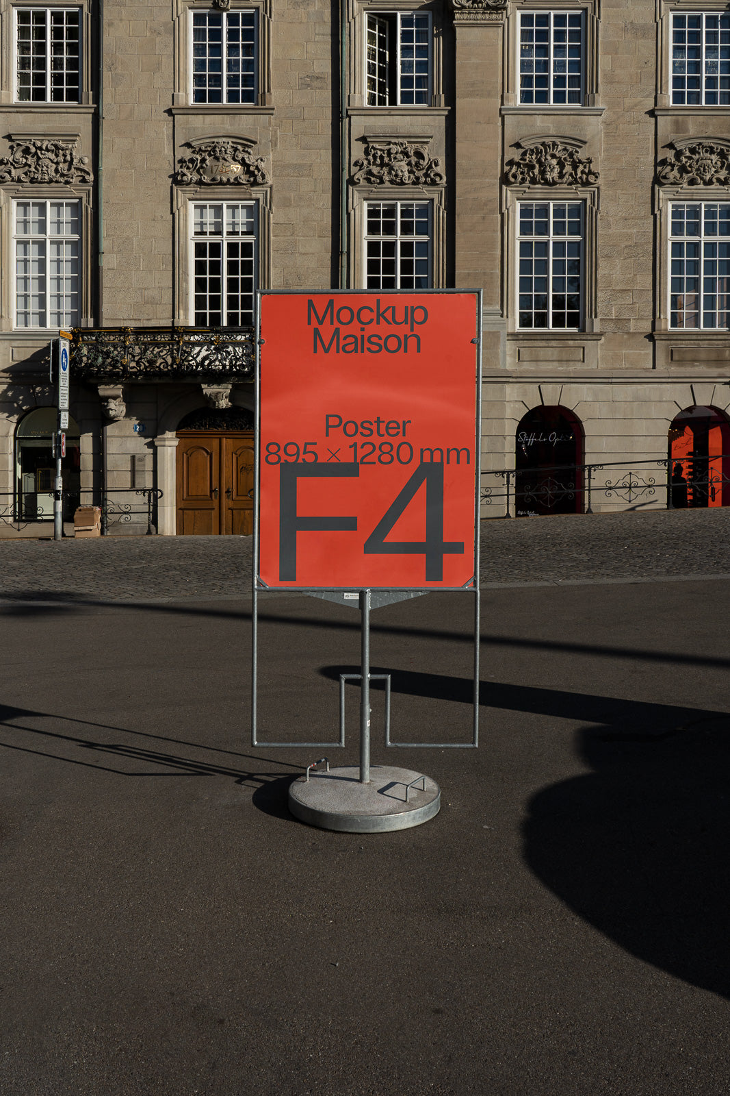 PSD mockup of a large outdoor poster display with dimensions 895x1280 mm, set against a historic building background.